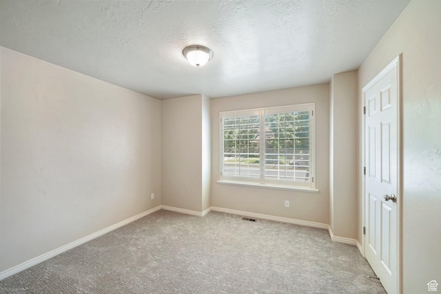 2051 E 1180 S, Spanish Fork, UT 84660 - carpeted empty room with baseboards and a textured ceiling