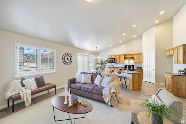 2051 E 1180 S, Spanish Fork, UT 84660 - living area featuring light wood-type flooring, recessed lighting, and lofted ceiling