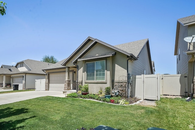 2051 E 1180 S, Spanish Fork, UT 84660 - ranch-style house with a gate, stone siding, concrete driveway, a garage, and stucco siding