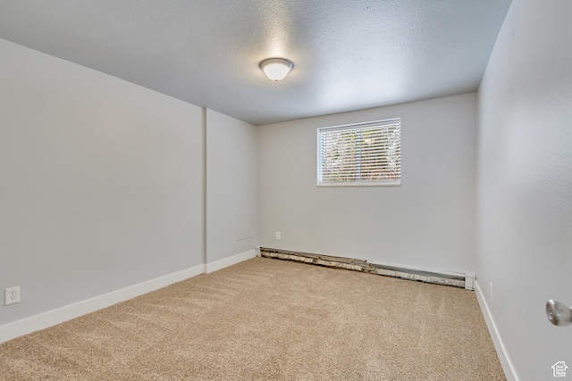 641 E Swenson Ave Unit 1, Springville, UT 84663 - carpeted spare room featuring baseboard heating and a textured ceiling