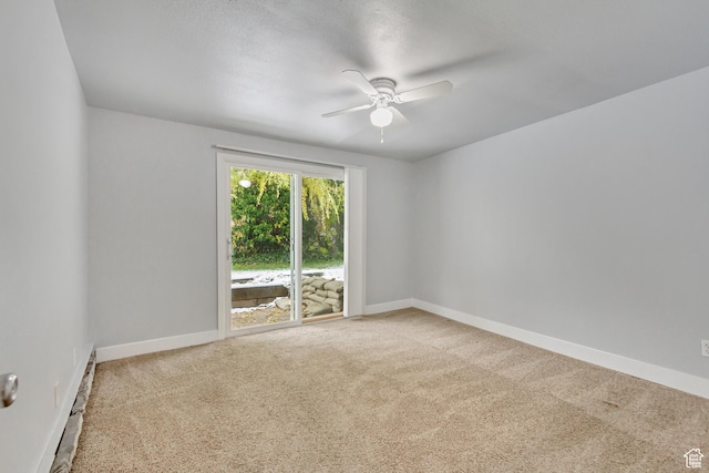 641 E Swenson Ave Unit 1, Springville, UT 84663 - spare room featuring a ceiling fan, carpet floors, and a baseboard radiator