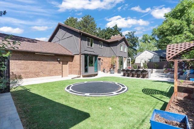 2494 E Murray Holladay Rd S, Holladay, UT 84117 - rear view of property featuring a patio and brick siding