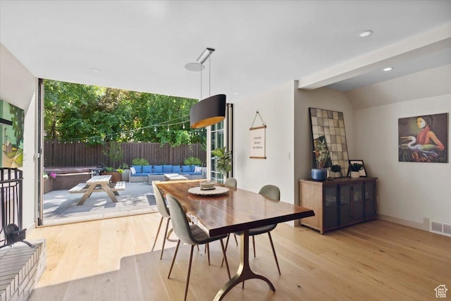 2494 E Murray Holladay Rd S, Holladay, UT 84117 - dining room with wood finished floors and floor to ceiling windows