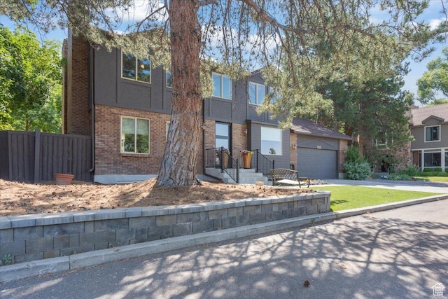 2494 E Murray Holladay Rd S, Holladay, UT 84117 - view of front of house with brick siding and driveway