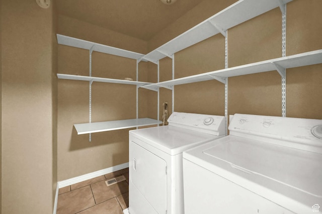 419 E 475 N, Ogden, UT 84404 - laundry area with washing machine and dryer and light tile patterned floors