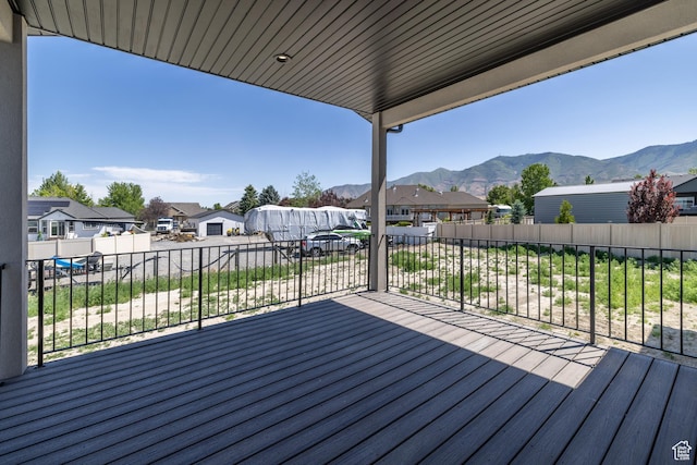 335 E Ventura Blvd, Stansbury Park, UT 84074 - wooden terrace featuring a residential view and a mountain view
