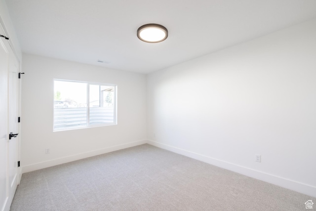 335 E Ventura Blvd, Stansbury Park, UT 84074 - empty room featuring light colored carpet