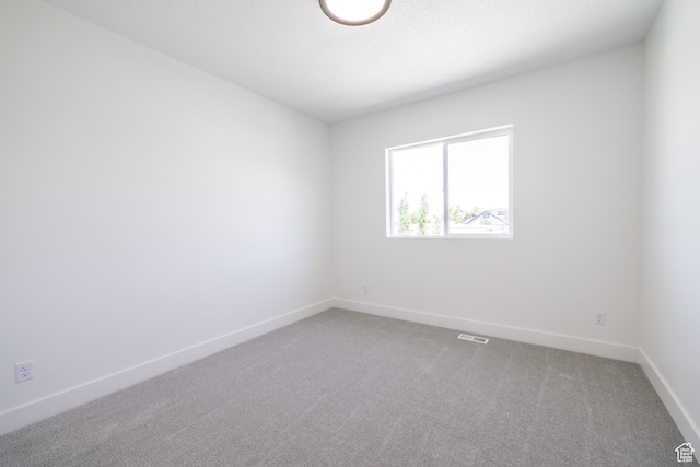 335 E Ventura Blvd, Stansbury Park, UT 84074 - carpeted empty room featuring baseboards