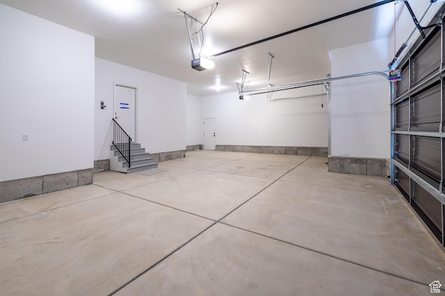 335 E Ventura Blvd, Stansbury Park, UT 84074 - garage with a garage door opener