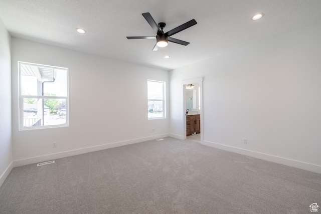 335 E Ventura Blvd, Stansbury Park, UT 84074 - empty room featuring plenty of natural light, light colored carpet, recessed lighting, and a ceiling fan