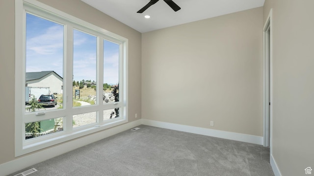 7233 W Summit Top Ln, Herriman, UT 84096 - spare room featuring healthy amount of natural light, carpet flooring, ceiling fan, and recessed lighting
