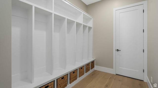 7233 W Summit Top Ln, Herriman, UT 84096 - mudroom with light wood-style floors and baseboards