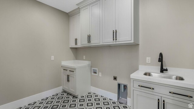 7233 W Summit Top Ln, Herriman, UT 84096 - laundry room featuring cabinet space, hookup for a washing machine, hookup for an electric dryer, and light flooring