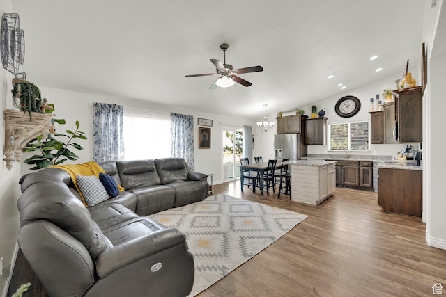 369 E Shelley Ln, Grantsville, UT 84029 - living area featuring ceiling fan, lofted ceiling, light wood-type flooring, recessed lighting, and a chandelier