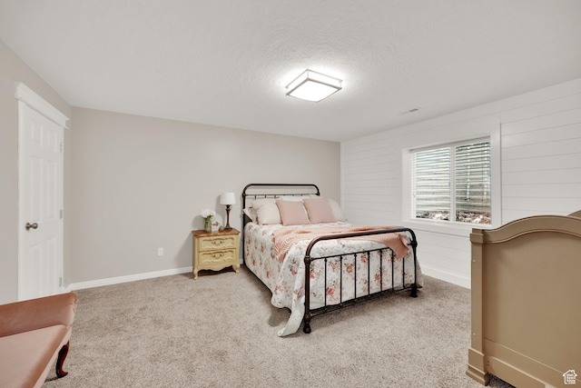 369 E Shelley Ln, Grantsville, UT 84029 - bedroom featuring carpet, a textured ceiling, and wooden walls