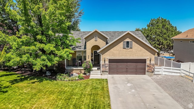 369 E Shelley Ln, Grantsville, UT 84029 - traditional home with stucco siding, driveway, stone siding, a porch, and a shingled roof