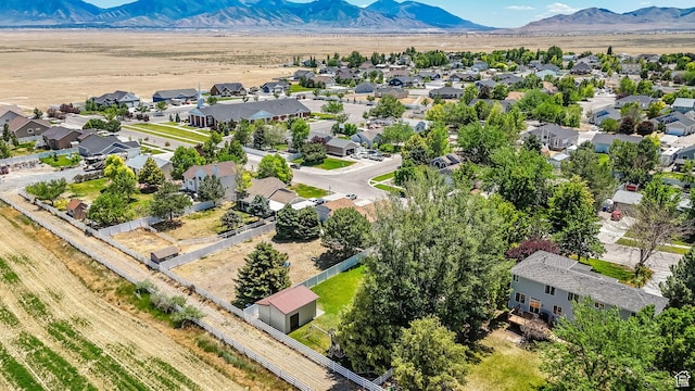369 E Shelley Ln, Grantsville, UT 84029 - aerial perspective of suburban area with a mountainous background
