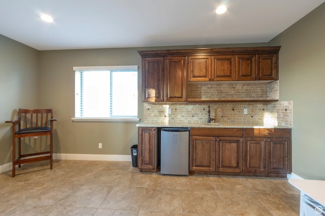4948 W 4025 S, West Haven, UT 84401 - kitchen with dishwasher, backsplash, and light stone counters
