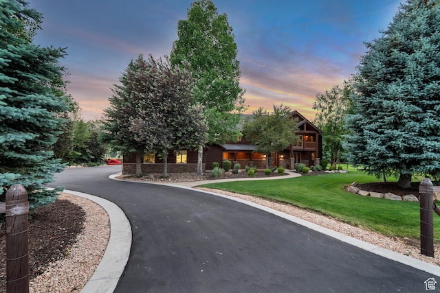 2984 Winterton Rd, Charleston, UT 84032 - view of front of property featuring a lawn, stone siding, and asphalt driveway