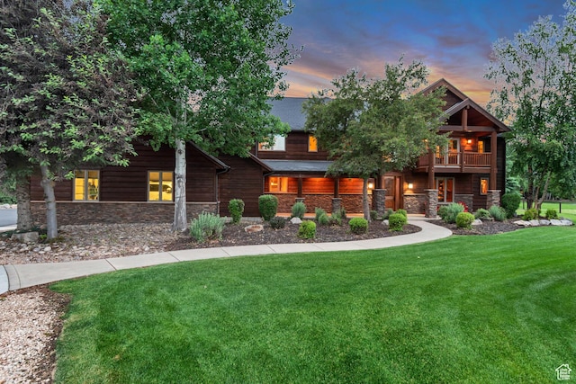 2984 Winterton Rd, Charleston, UT 84032 - view of front of property featuring stone siding, a yard, and a balcony