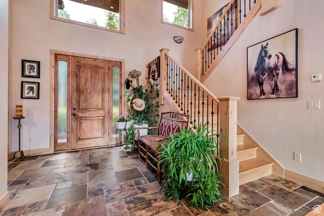 2984 Winterton Rd, Charleston, UT 84032 - foyer entrance featuring a towering ceiling, stairway, and stone tile flooring