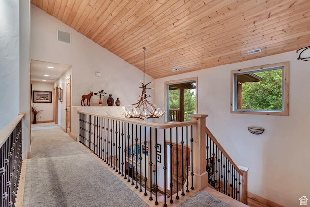 2984 Winterton Rd, Charleston, UT 84032 - corridor with vaulted ceiling, a chandelier, healthy amount of natural light, wood ceiling, and carpet flooring