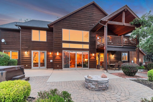 2984 Winterton Rd, Charleston, UT 84032 - rear view of property with a hot tub, an outdoor fire pit, and a patio