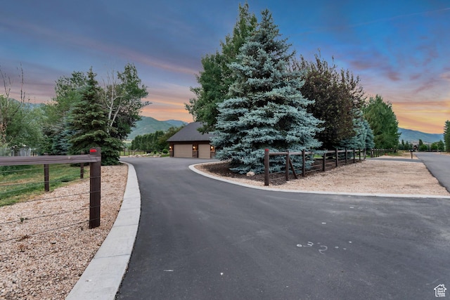 2984 Winterton Rd, Charleston, UT 84032 - view of property hidden behind natural elements with a detached garage and a mountain view