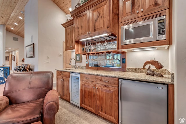 2984 Winterton Rd, Charleston, UT 84032 - indoor wet bar featuring beverage cooler, stainless steel microwave, fridge, wooden ceiling, and light carpet