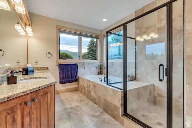 2984 Winterton Rd, Charleston, UT 84032 - full bathroom with vanity, a bath, and a shower stall