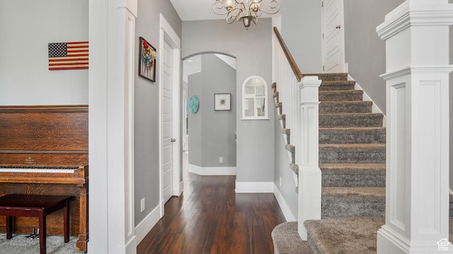721 W Glovers Ln, Farmington, UT 84025 - foyer entrance with arched walkways, wood finished floors, stairway, and a chandelier