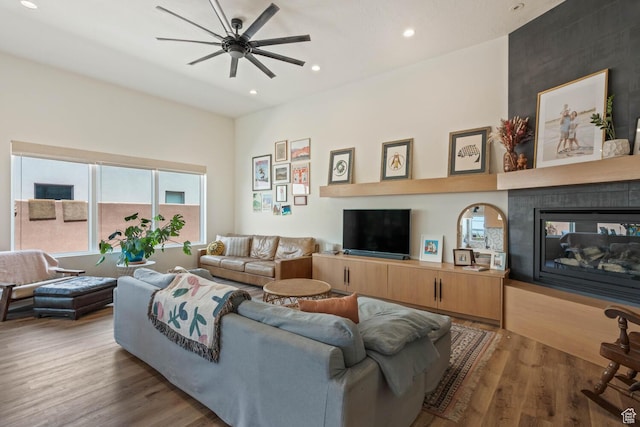 3214 S Red Sands Way, Hurricane, UT 84737 - living area with a ceiling fan, wood finished floors, recessed lighting, and a multi sided fireplace
