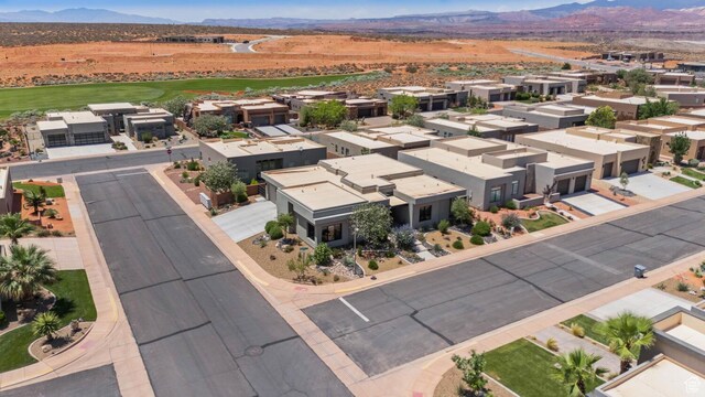 3214 S Red Sands Way, Hurricane, UT 84737 - aerial view of residential area with a mountain backdrop