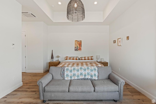3214 S Red Sands Way, Hurricane, UT 84737 - bedroom featuring wood finished floors, recessed lighting, and a tray ceiling