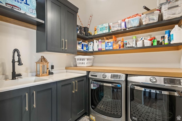 3214 S Red Sands Way, Hurricane, UT 84737 - laundry area with cabinet space and washer and clothes dryer