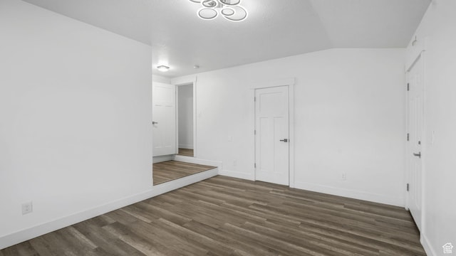 540 E 400 N, Spanish Fork, UT 84660 - empty room featuring dark wood-style flooring and vaulted ceiling
