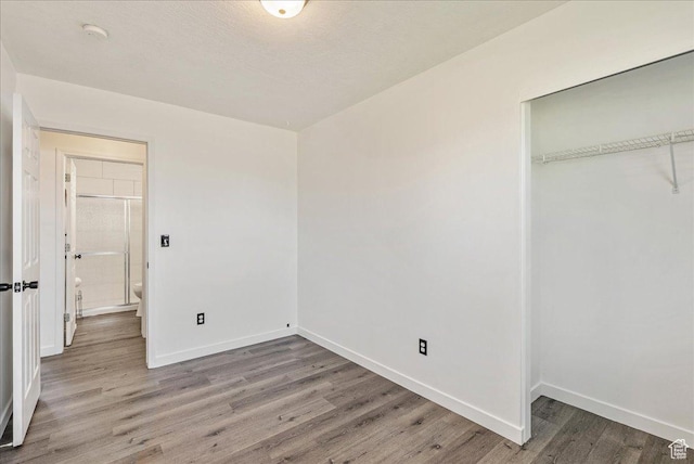 655 S 100 W, Santaquin, UT 84655 - unfurnished bedroom with wood finished floors and a closet