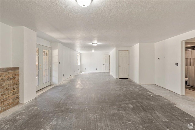 655 S 100 W, Santaquin, UT 84655 - spare room with a textured ceiling and french doors