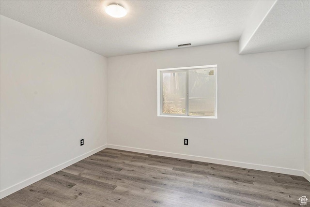 655 S 100 W, Santaquin, UT 84655 - unfurnished room featuring wood finished floors and a textured ceiling