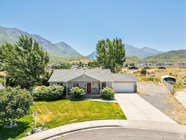 655 S 100 W, Santaquin, UT 84655 - ranch-style home featuring a garage, a mountain view, driveway, and a front lawn