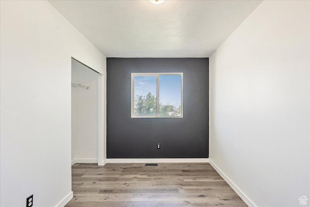 655 S 100 W, Santaquin, UT 84655 - unfurnished bedroom with wood finished floors and a closet