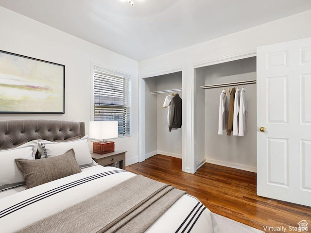 143 N 800 W, Provo, UT 84601 - bedroom with multiple closets and wood finished floors