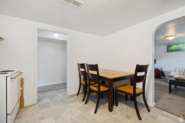 143 N 800 W, Provo, UT 84601 - dining room featuring arched walkways and baseboards