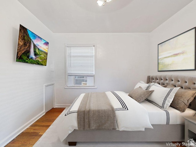 143 N 800 W, Provo, UT 84601 - bedroom featuring wood finished floors and baseboards