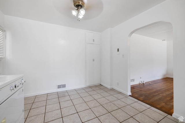 143 N 800 W, Provo, UT 84601 - unfurnished dining area featuring arched walkways, a ceiling fan, and light tile patterned flooring