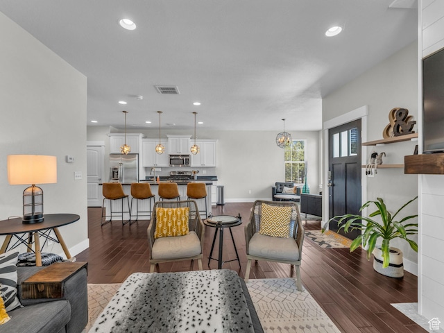 4966 W Willamette Way S, South Jordan, UT 84095 - living area featuring dark wood-style flooring and recessed lighting
