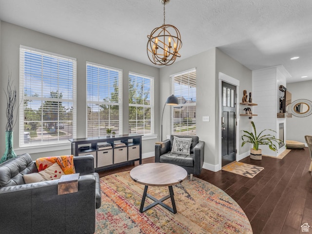 4966 W Willamette Way S, South Jordan, UT 84095 - living area featuring a chandelier, wood finished floors, and recessed lighting