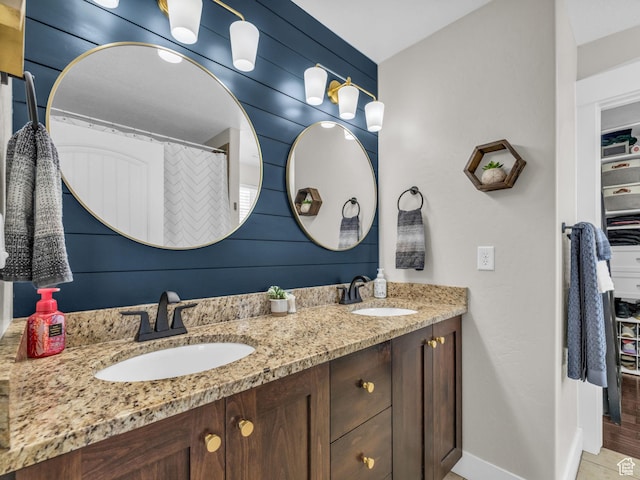 4966 W Willamette Way S, South Jordan, UT 84095 - bathroom with double vanity and baseboards