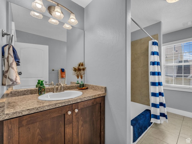 4966 W Willamette Way S, South Jordan, UT 84095 - full bathroom featuring vanity, tile patterned flooring, a textured ceiling, and tiled shower / bath