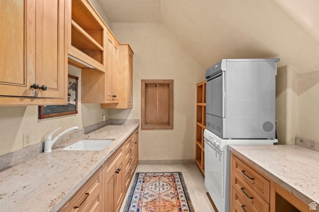 6033 S 2300 E, Holladay, UT 84121 - washroom featuring stacked washer and clothes dryer and cabinet space